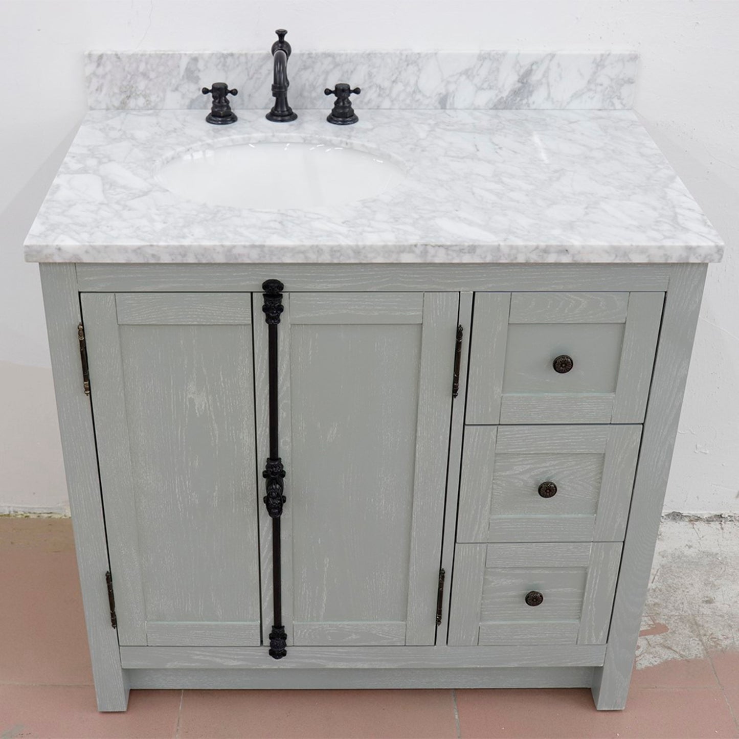 37" Single vanity in Gray Ash finish with White Carrara top and oval sink Left doors/Left sink