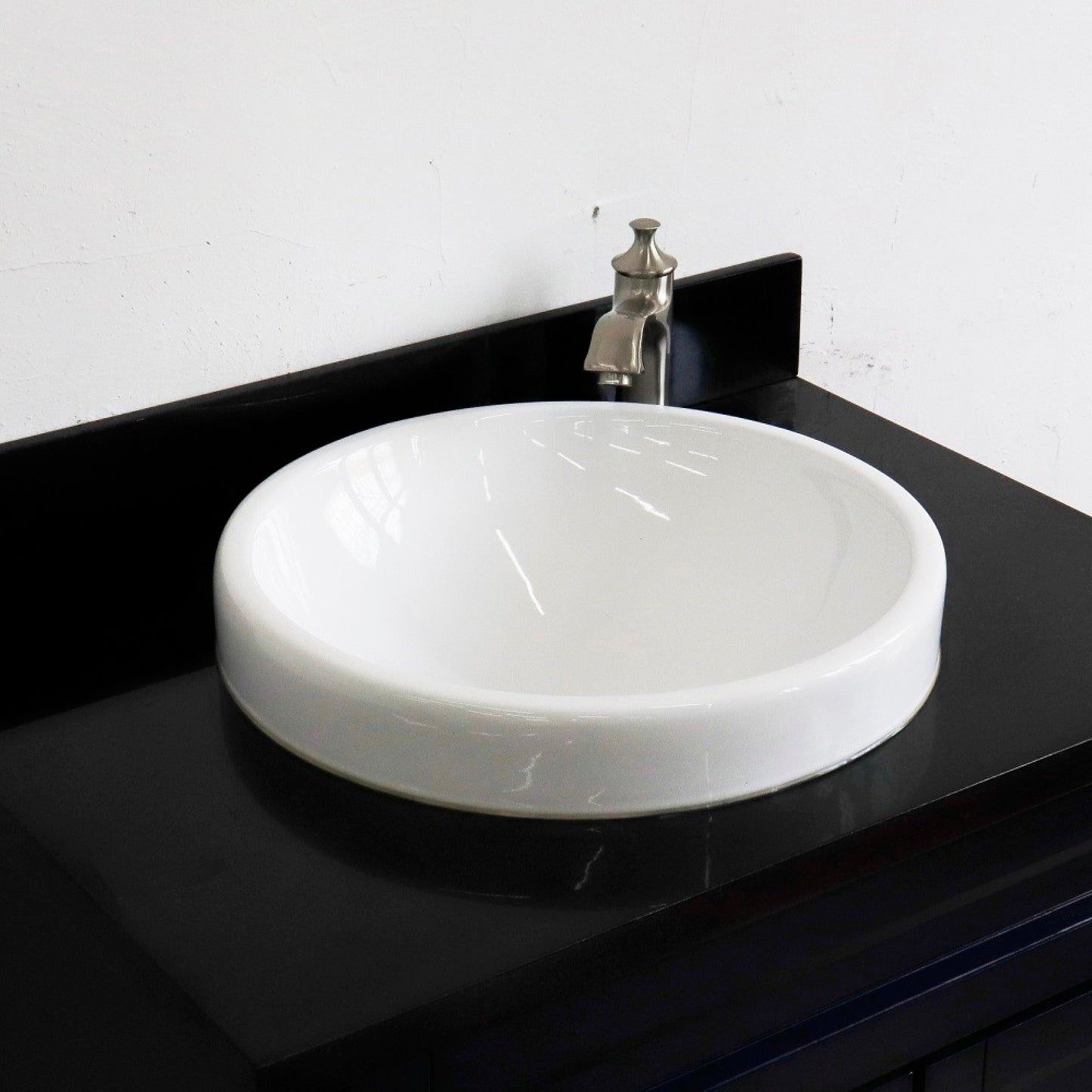 31" Single sink vanity in Blue finish with Black galaxy granite with round sink
