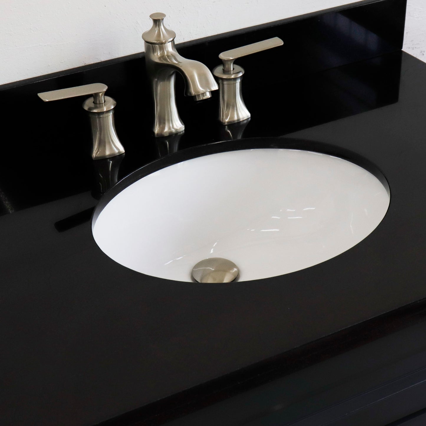 37" Single sink vanity in Dark Gray finish with Black galaxy granite and CENTER oval sink RIGHT drawers