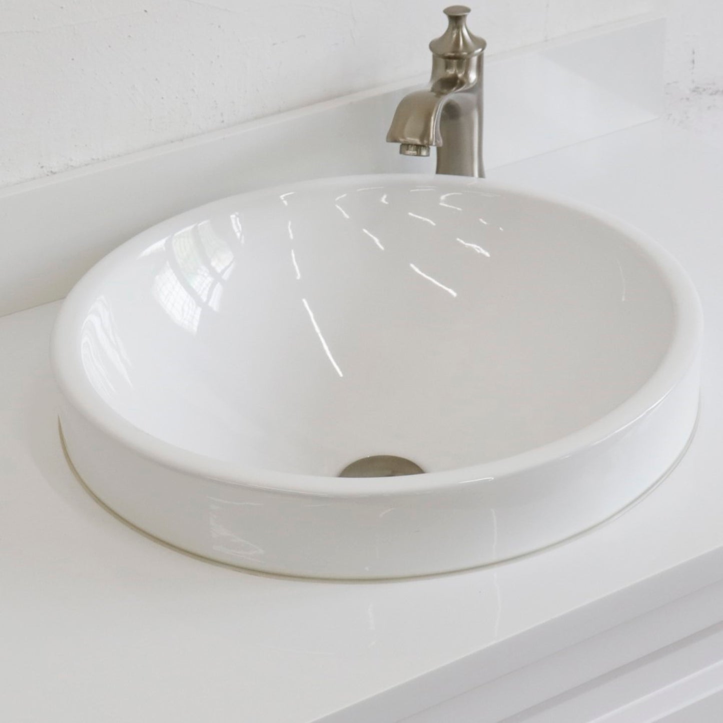 37" Single sink vanity in White finish with White engineered stone and CENTER round sink RIGHT drawers