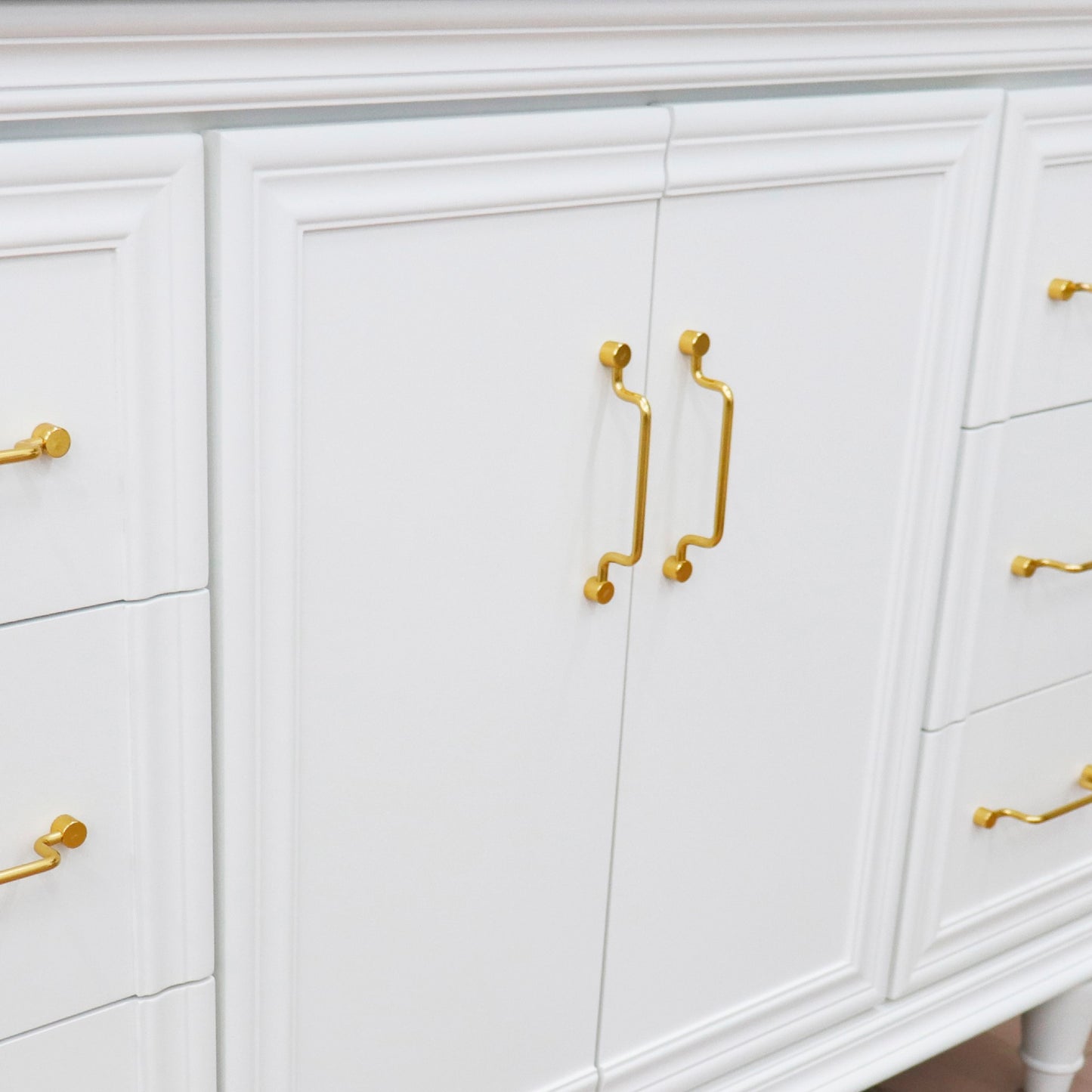 49" Single sink vanity in White finish with White carrara marble and round sink