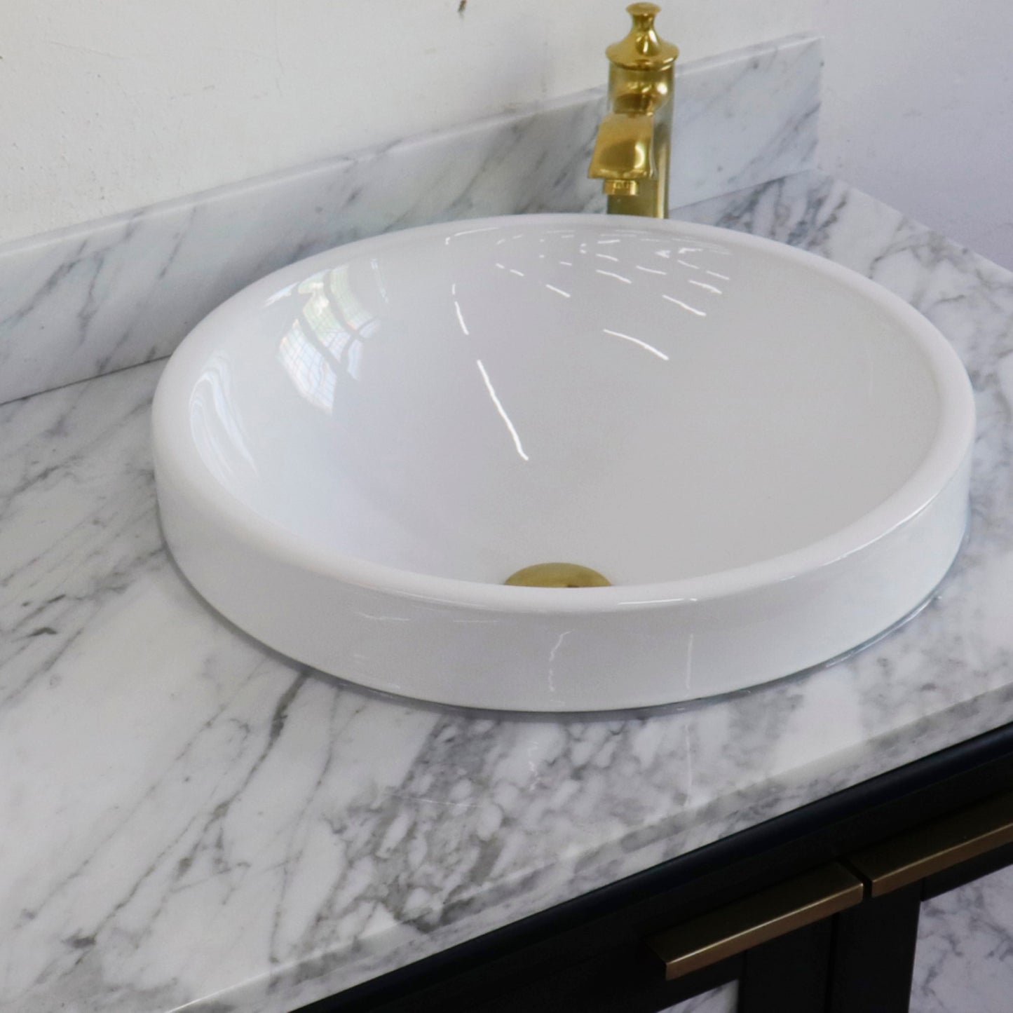 43" Single vanity in Dark Gray finish with White Carrara and round sink Right door/Right sink
