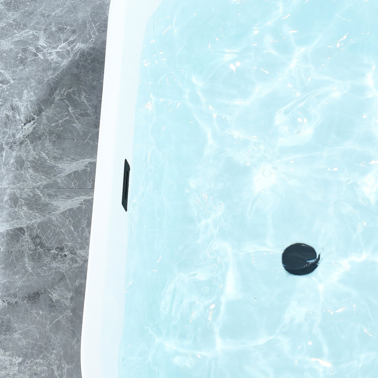 Kaprun 59" x 30" Flatbottom Freestanding Acrylic Soaking Bathtub in Glossy White with Drain and Overflow