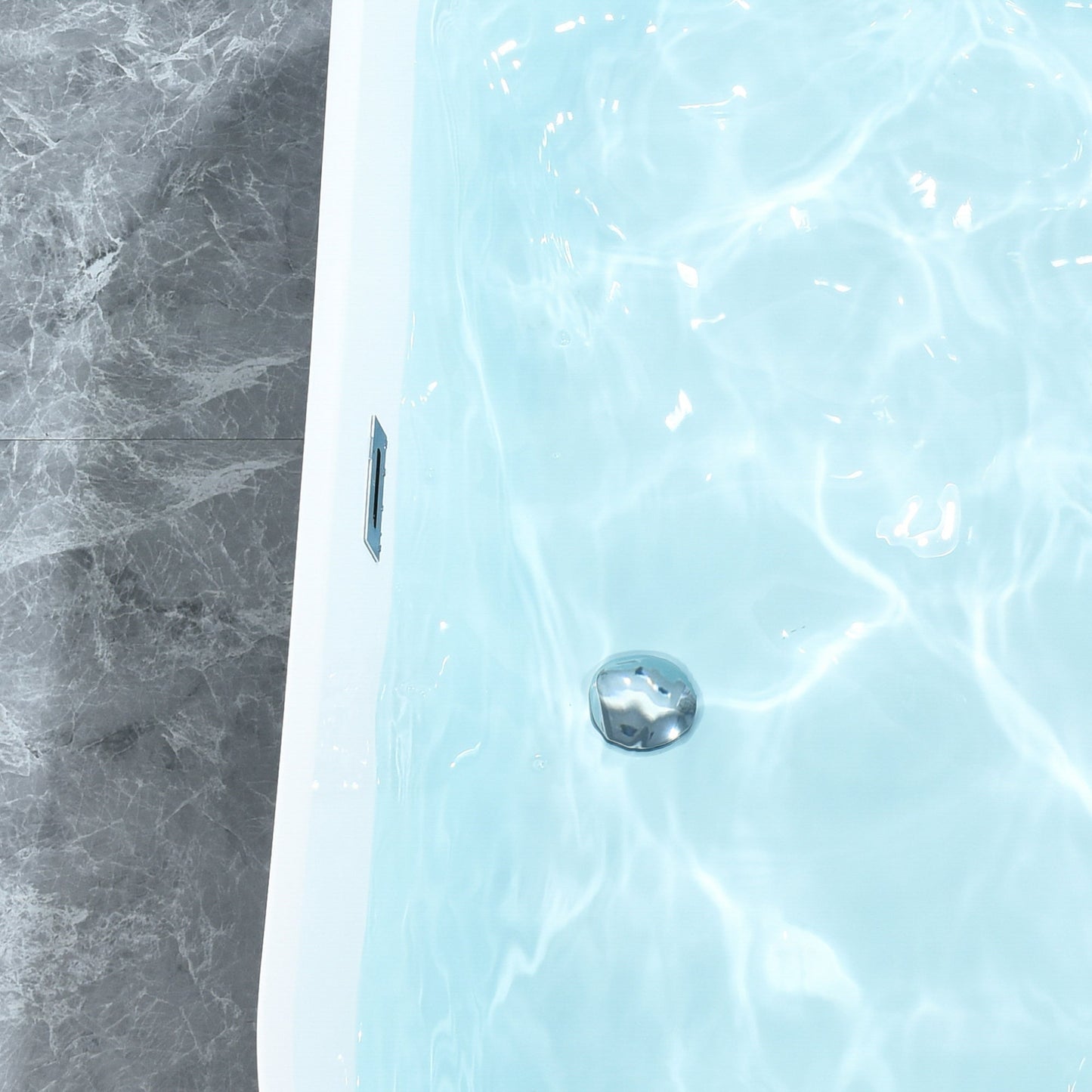 Kaprun 63" x 30" Flatbottom Freestanding Acrylic Soaking Bathtub in Glossy Black with Drain and Overflow