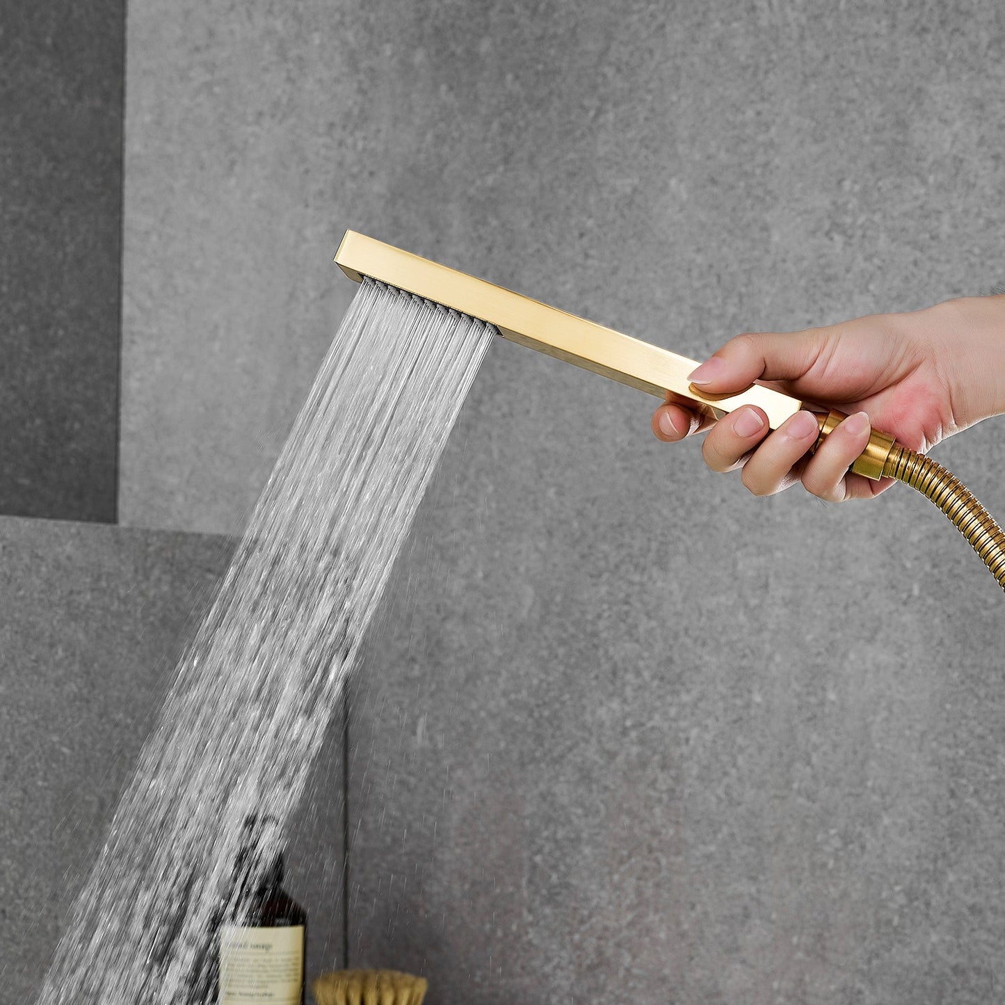 Nairn Deck-Mount Roman Waterfall Tub Filler in Brushed Gold with Handshower