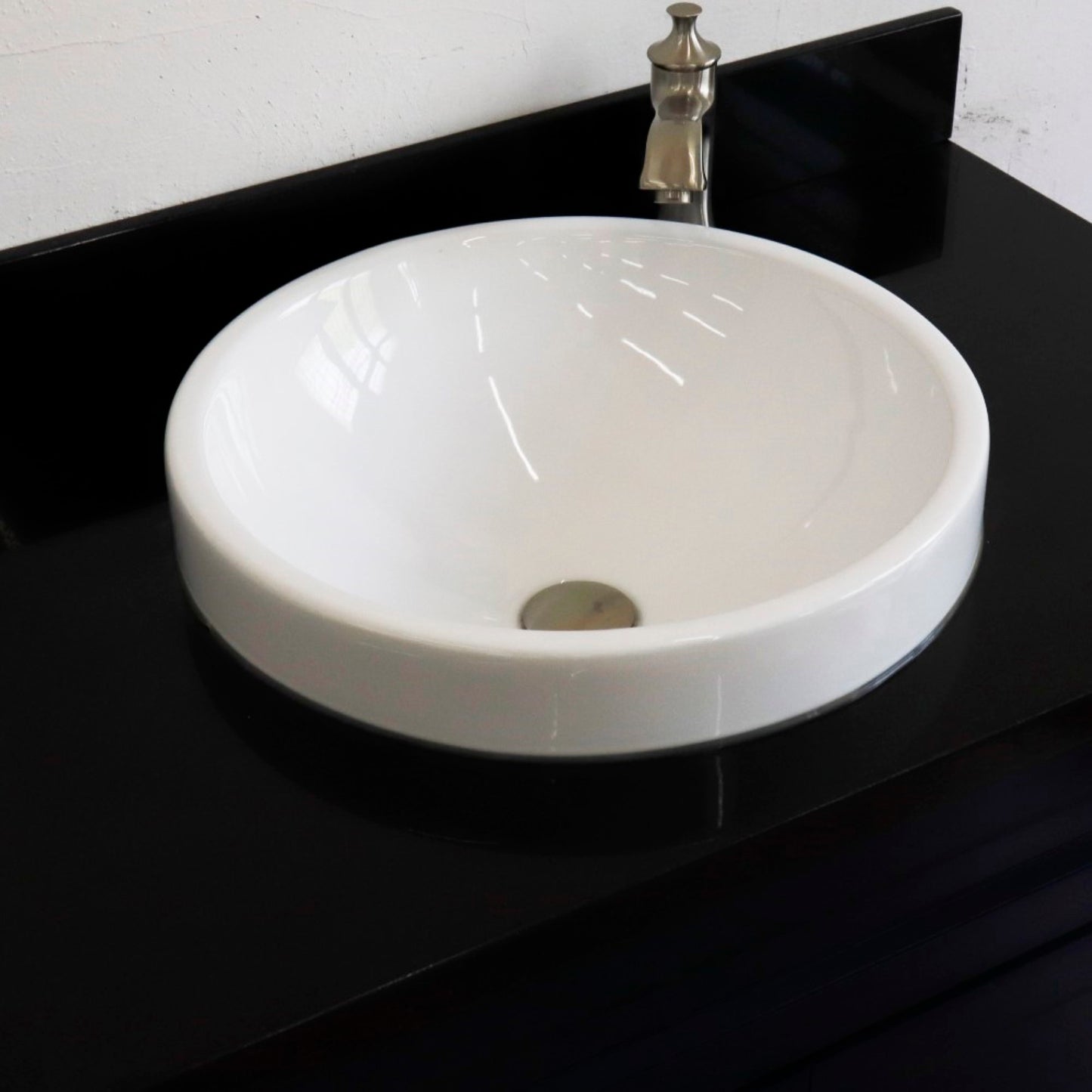 37" Single sink vanity in Blue finish with Black galaxy granite and CENTER round sink RIGHT drawers