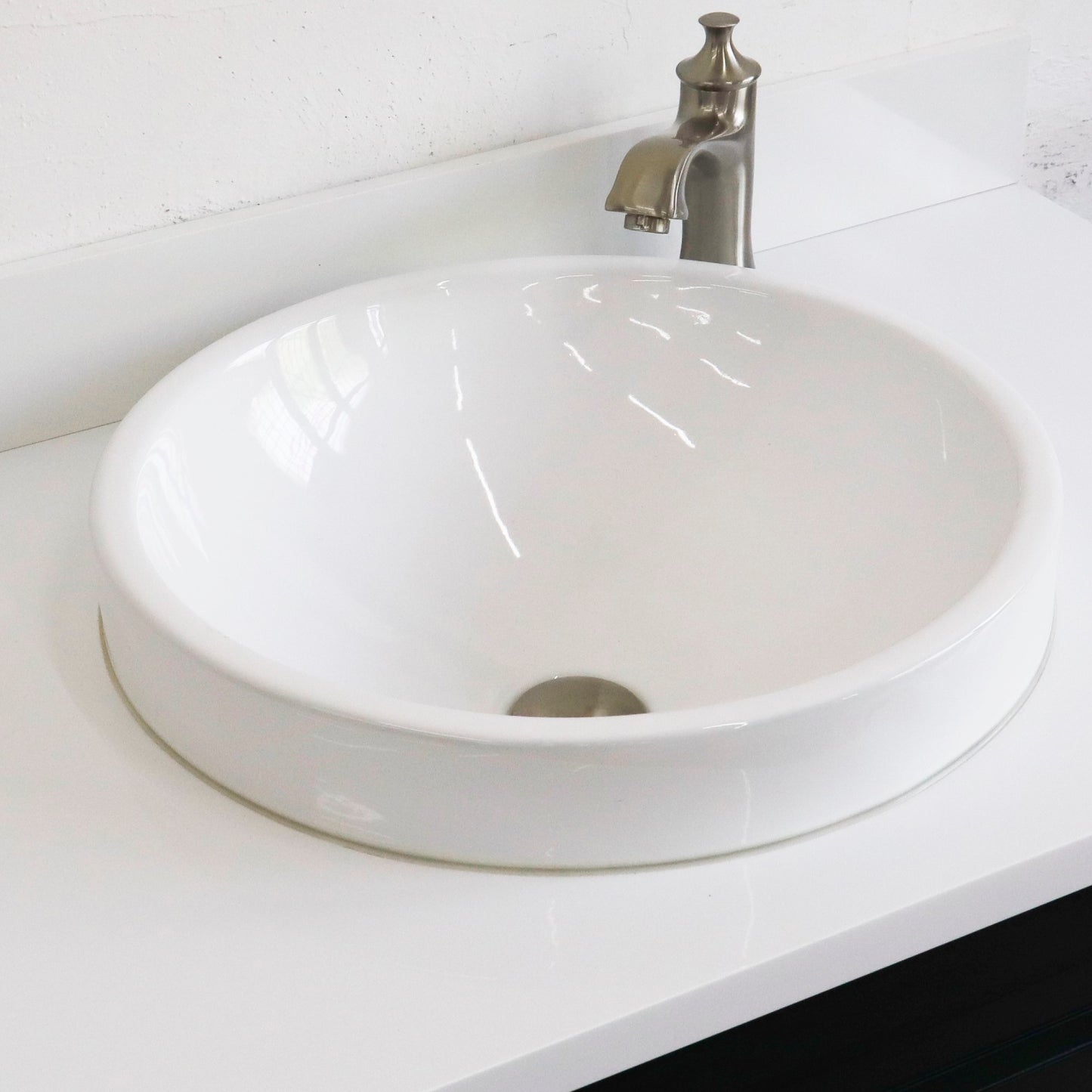 37" Single sink vanity in Dark Gray finish with White engineered stone and CENTER round sink RIGHT drawers