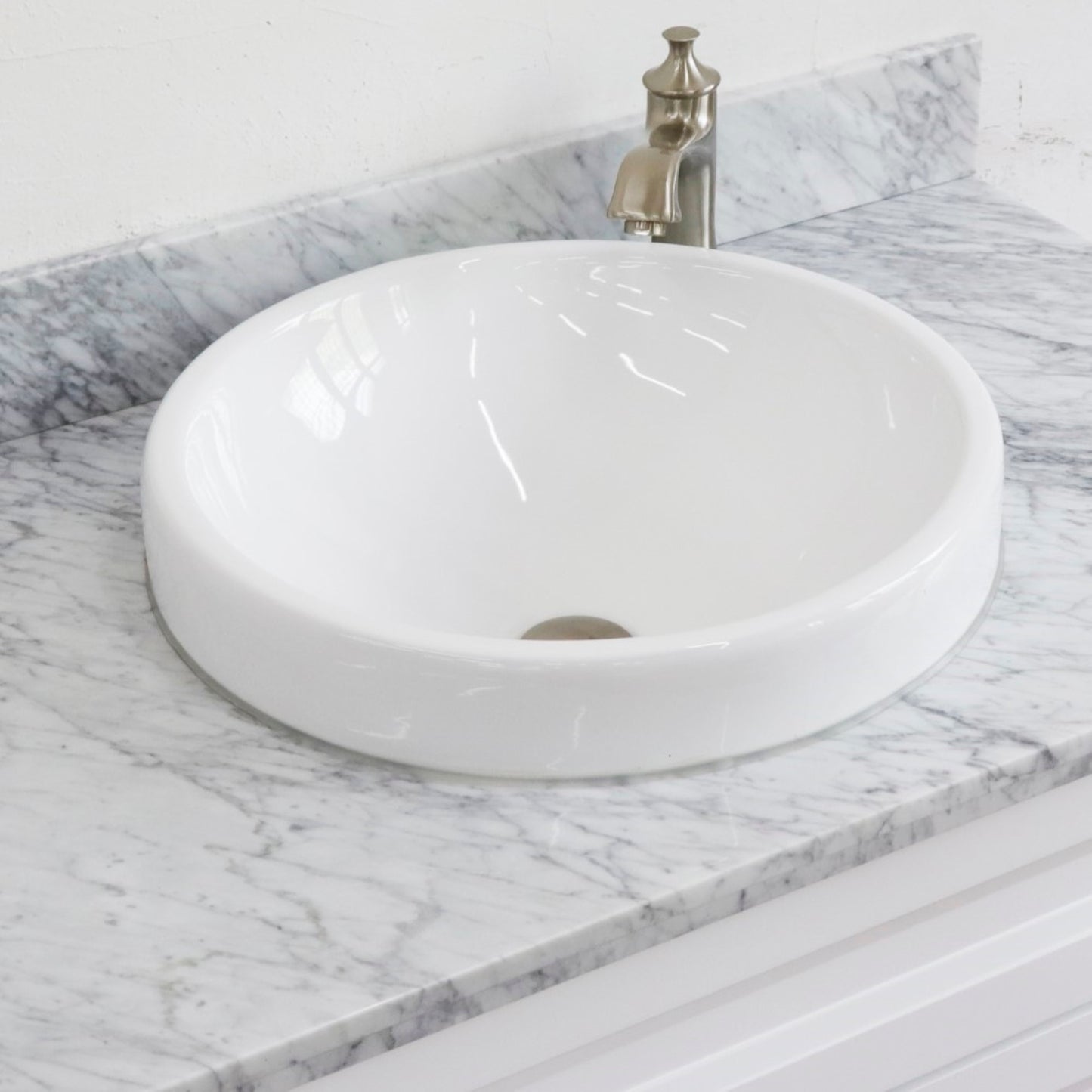 37" Single sink vanity in White finish with White Carrara marble and CENTER round sink RIGHT drawers